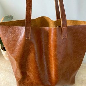 Handcrafted leather tote.